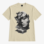 STF Dreamscape Graphic T-Shirt in Cream — Front flat lay with surreal moon and face graphic