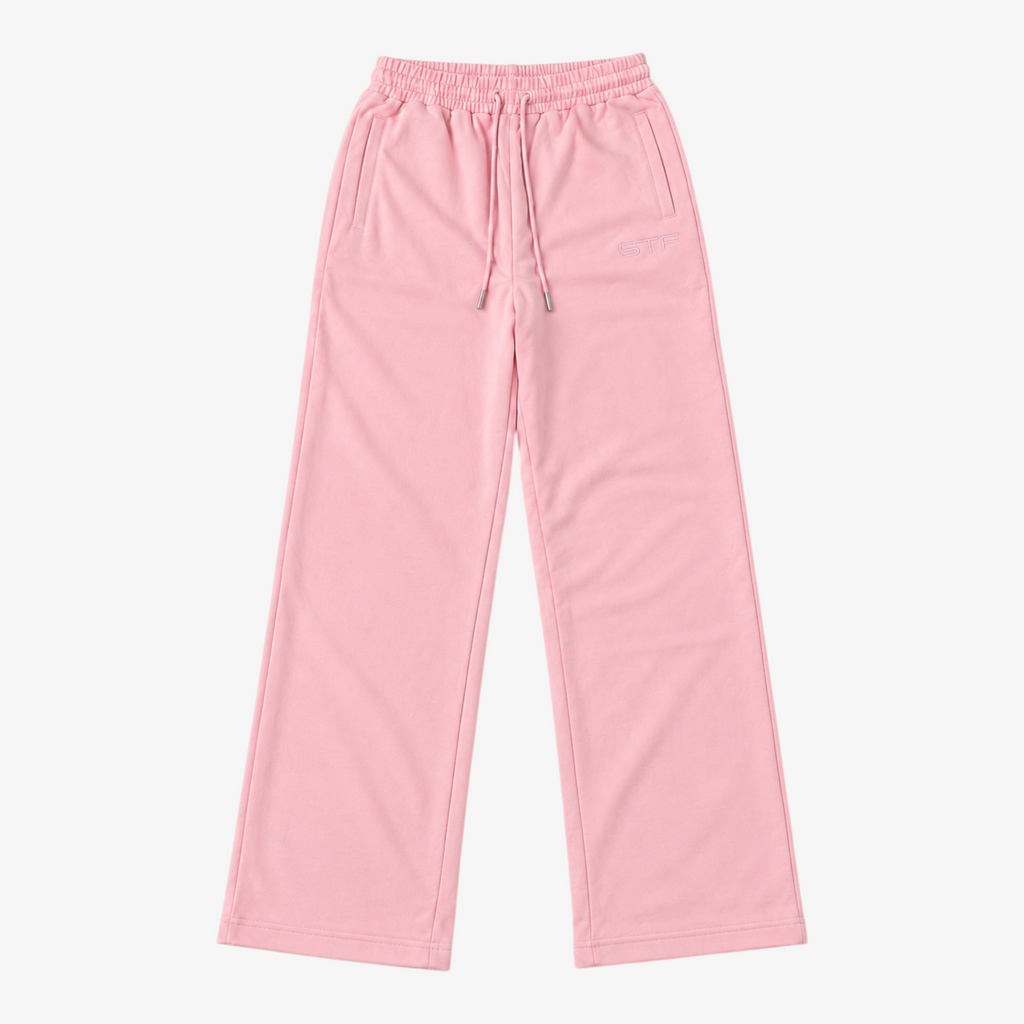 STF relaxed open-hem trousers in pink — Front flatlay
