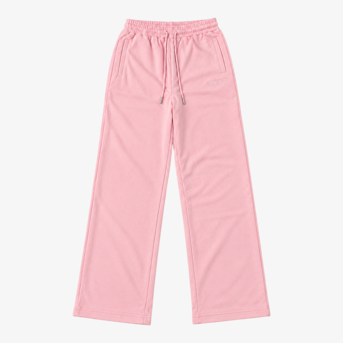 STF relaxed open-hem trousers in pink — Front flatlay