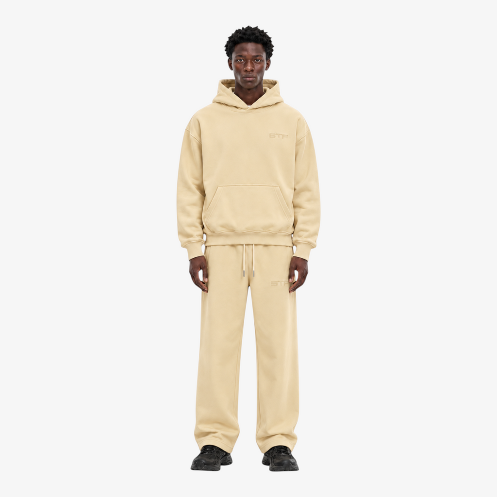 STF oversized boxy cream hoodie and trouser set — Male model front