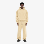 STF oversized boxy cream hoodie and trouser set — Male model front