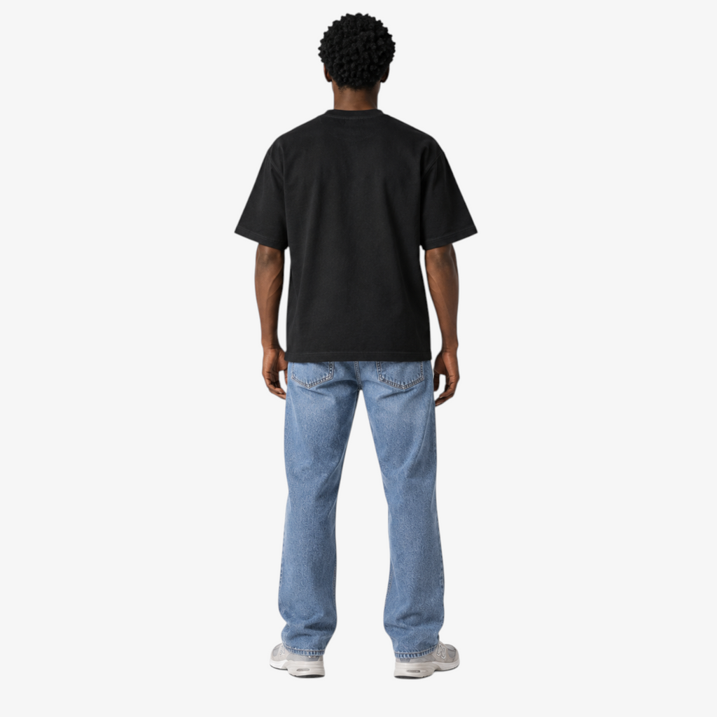 Male model wearing STF black boxy oversized T-shirt back view