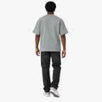 Male model wearing STF sage-grey boxy oversized T-shirt back view
