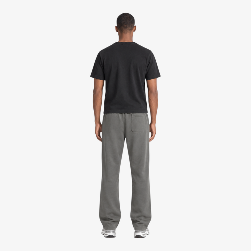 STF grey relaxed open-hem trousers — male back view