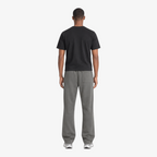 STF grey relaxed open-hem trousers — male back view