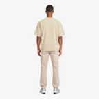 STF Motion in Stillness cream boxy oversized T-shirt — male back