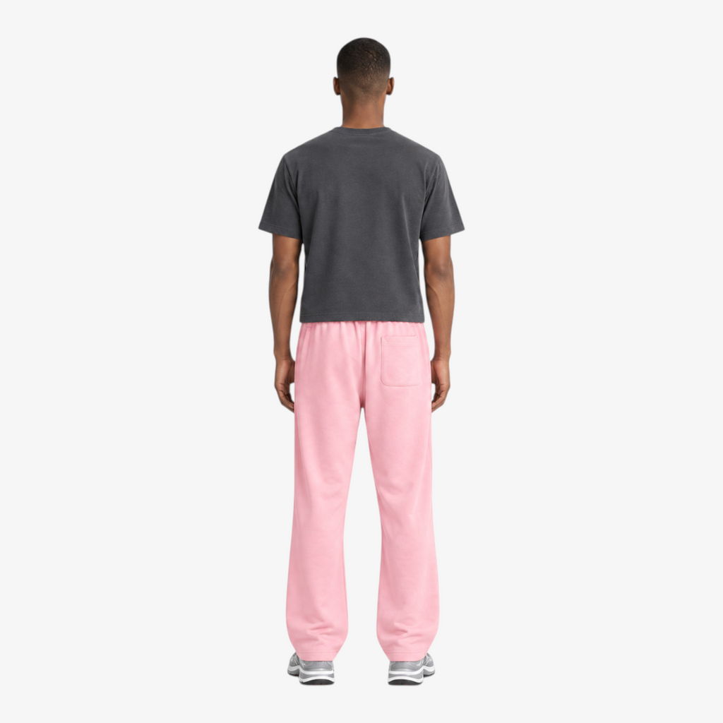 STF relaxed open-hem trousers in pink — Male model back