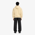 STF oversized boxy hoodie in cream — Male model back view