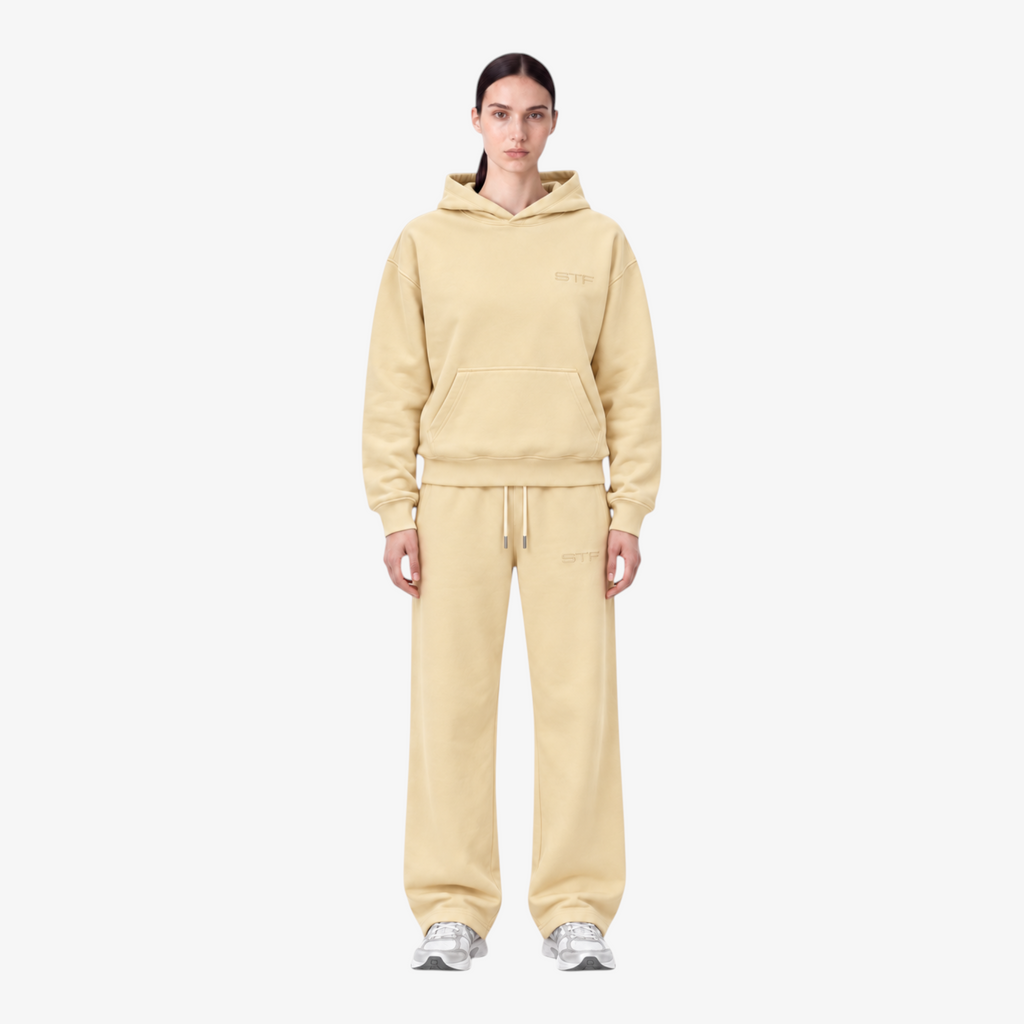 STF oversized boxy cream hoodie and trouser set — Female model front