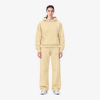 STF oversized boxy cream hoodie and trouser set — Female model front