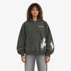 STF Built in Silence boxy oversized hoodie in washed olive-charcoal — female front