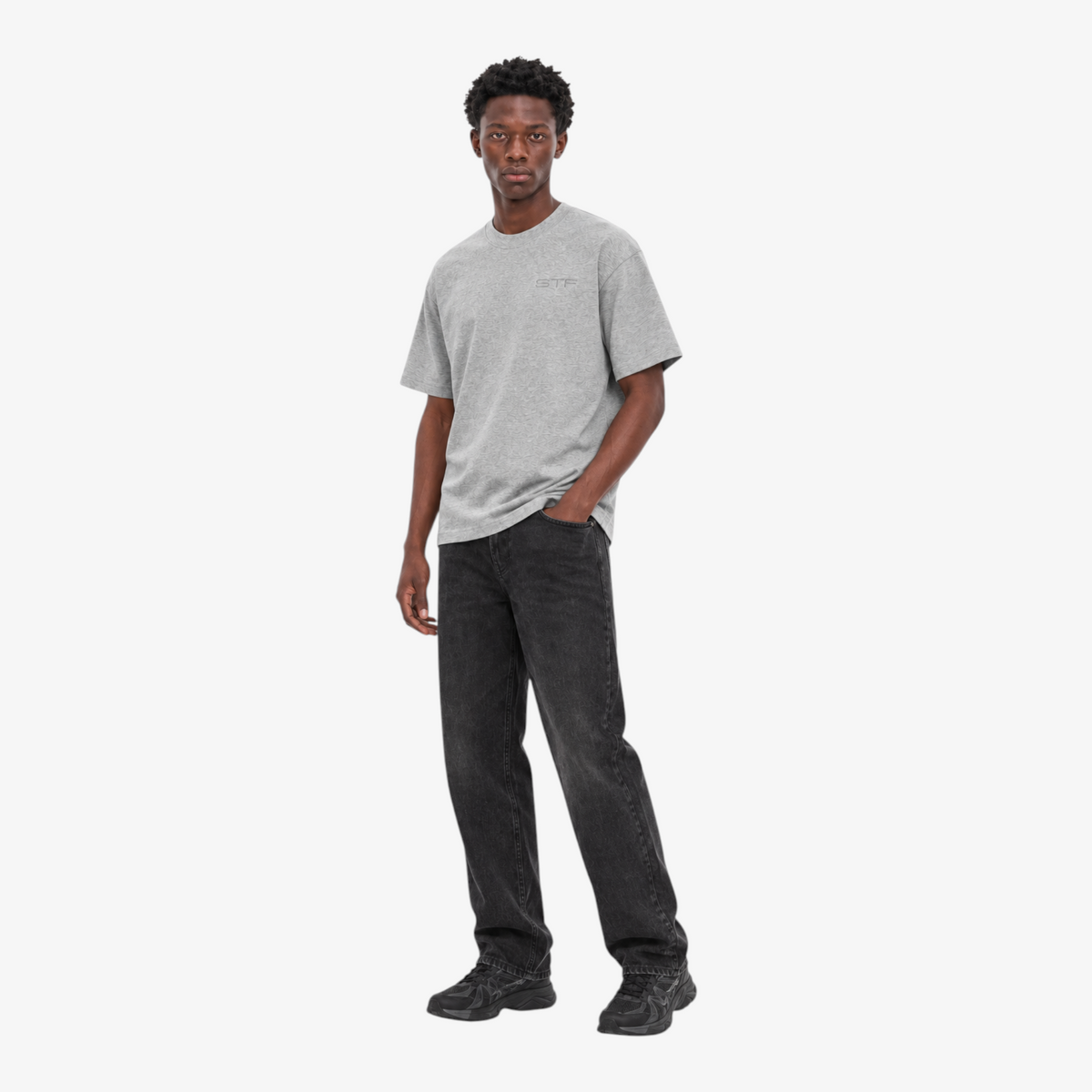 STF Tonal T-Shirt in Grey Marl — Male model three-quarter front view