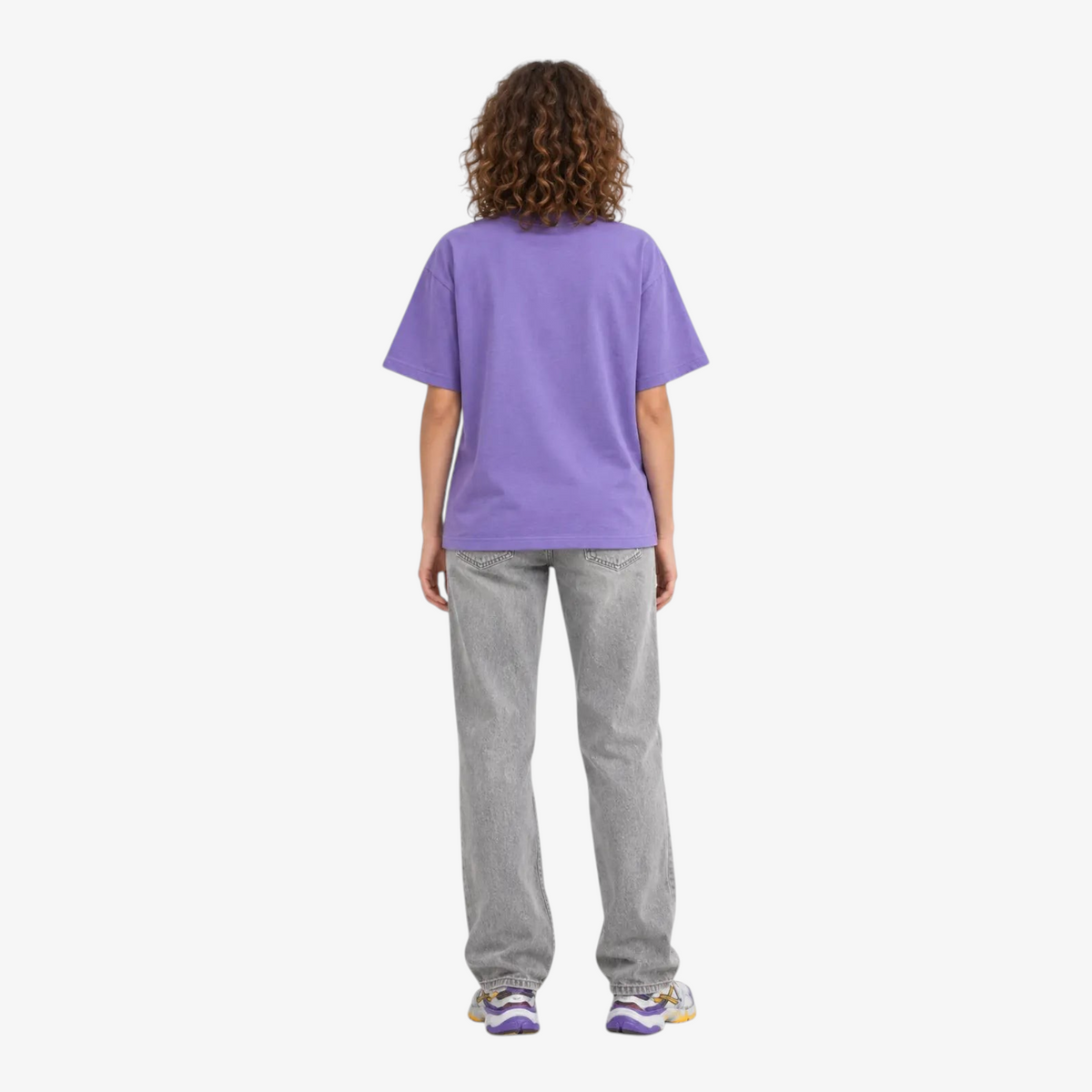 Female model wearing STF lavender boxy oversized T-shirt back view
