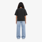 STF Silence Builds washed-black oversized T-shirt — female back