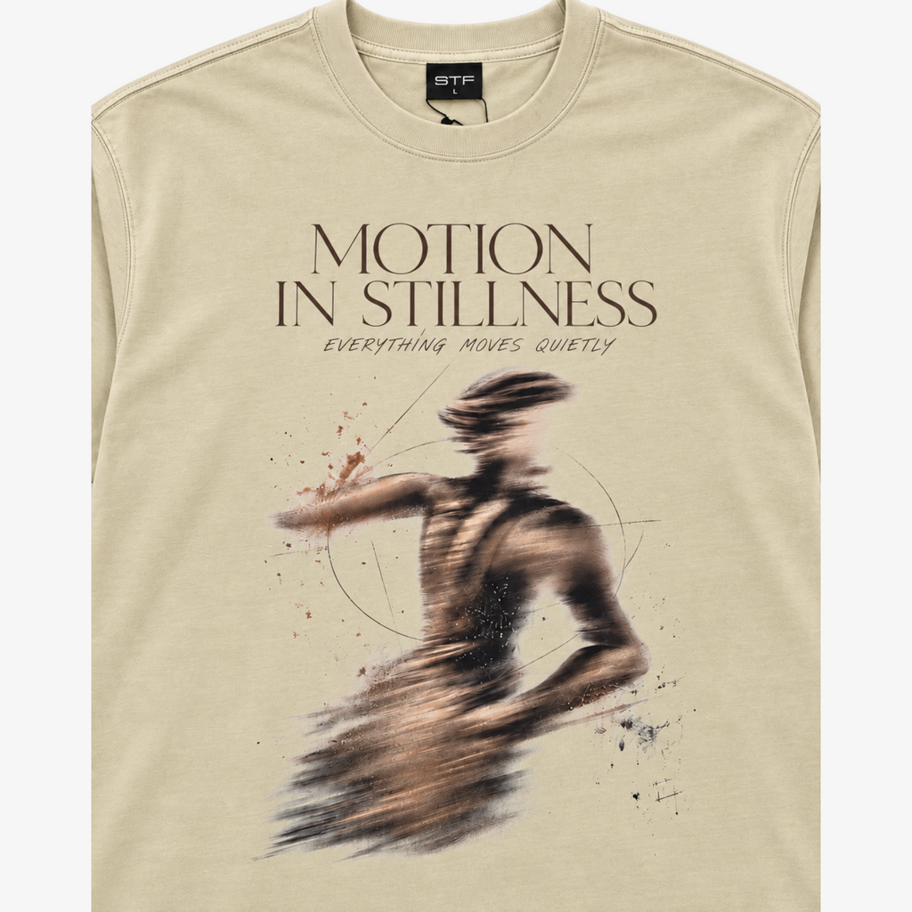 STF Motion in Stillness cream boxy oversized T-shirt — graphic detail
