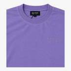 STF lavender T-shirt neck label and tonal embroidery detail