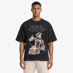 STF Motion in Stillness washed-black boxy oversized T-shirt — male closeup