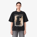 STF Nothing to Prove washed black boxy oversized T-shirt — female front closeup
