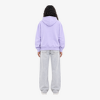 Back view of a person wearing a Seejthreadsflames (STF) lavender pullover hoodie with light wash denim jeans