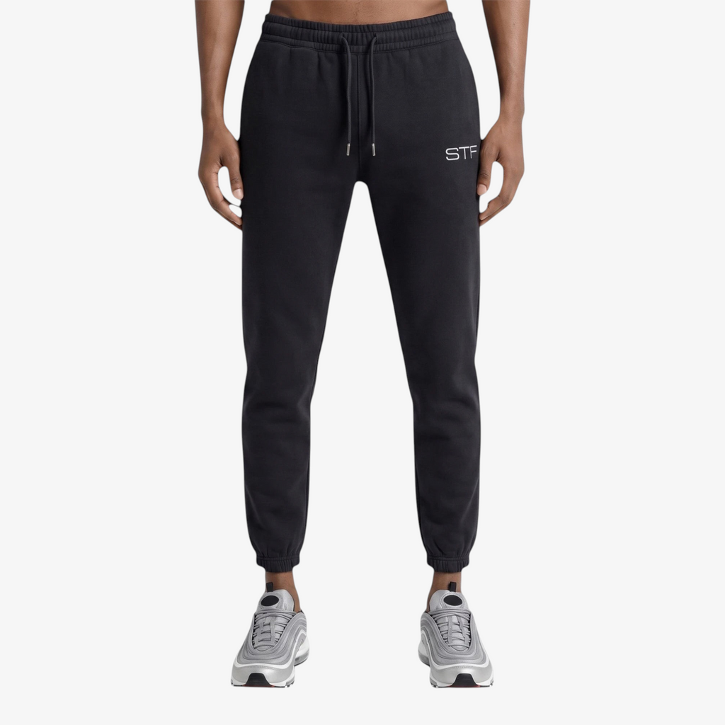 Seejthreadsflames (STF) black French terry joggers with a tapered fit, drawcord waist, and embroidered logo.